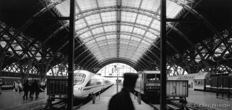 2000.08 LE-Hauptbahnhof_hf <div align=left>Aug 2000<br>Dear readers, <br>A quiet Monday morning, disturbed only by the ubiquitous swarms of construction workers, reading the English newspapers in a downtown cafe...while the rest of Germany seems to be on holiday and complaining about the waning Summer. <br>Despite the air of calm, its been an interesting month here in Leipzig: a week-long Bach festival to commemorate the 250th anniversary of the death of the man who lay in an unmarked grave for almost 150 of those years. I heard that we were visited by a 70-strong Bach Cantata Choir from Auckland, but unfortunately I wasnt able to attend...also, the worlds biggest hot-air balloon festival, and a Tina Turner concert (yeah, missed those too!) <br>In the pic is another claim-to-fame: the Leipzig train station...26 platforms make this apparently the worlds biggest "head" station. Recently refurbished to also house one of the largest shopping malls in Germany, which is conveniently (unusual!) open on Sundays. <br>Saw an excellent Man Ray exhibition in Frankfurt, and suggest you check out James Nachtweys new book "Inferno" (interesting review can be found at www.digitaljournalist.org) <br>err...recovering from the housewarming party (held a mere 10 months after moving into the factory we call home). The only casualty being a window after two Americans decided to play baseball in the corridor at 2 a.m... <br>...nothing else to report at the moment. <br>Dean<br>