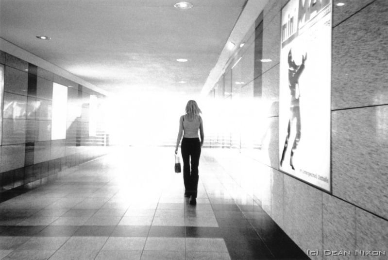 2002.08 Light at the End of the Tunnel. Leipzig _hf <div align=left>Aug 2002<br>Dear purveyers of fine tonal range,<br>I promised you a few thoughts on the current state of German photography, so...<br>If your eye hasnt been permanently glued to your viewfinder, youll know that there are quite a number of contemporary German photographers making a big impact on the art market. For example, last year, Christies sold a photo by Andreas Gursky for $US 600,000 (a record), and just a few frames behind him youll find Ruff, Struth, Hfer, Htte, Tillmans, Teller... most of whom have studied under Bernd & Hille Becher in Dsseldorf.<br>Whats the big deal?...well, the pics are usually large (up to 2 x 5m), colour, and often digitally altered/enhanced. They are highly sought after, and increasingly expensive. In particular Gursky: representative of a contemporary zeitgeist   a big, hi tech world...processed, packaged and delivered; with gaudy blandishments but without abandoning the [German] documentists observation: precise and intrinsically organised, yet powerfully and aesthetically his own. By transmuting chaos thru a Mondrian precision (NB go see the "Pollack" movie!) into a higher order to satisfy human longing which despairs in the face of the natural entropy of the world (Religion may be your only alternative!)<br>Heavy stuff?   this is Germany!<br>Dean<br>PS. Rumour: Gursky has been invited to work in NZ (watch this space!)<br>